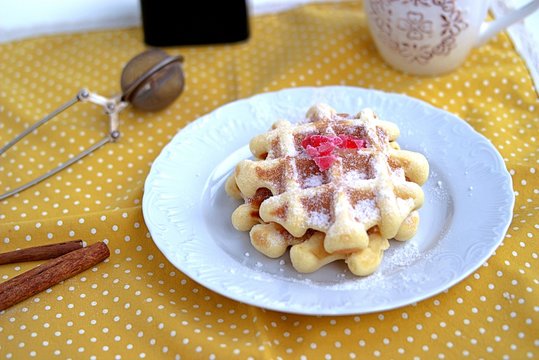 Crispy corn wafers sprinkled with powdered sugar