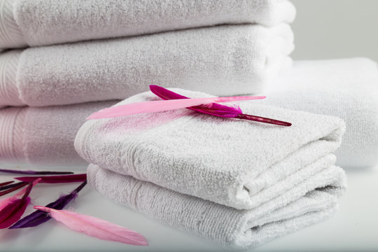Towel concept. Spa concept. Photo for hotels and massage parlors. Purity and softness. Towel textile. 
