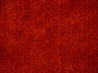 Close-up of the red carpet texture background and wallpaper in the room.The texture of red fabric...
