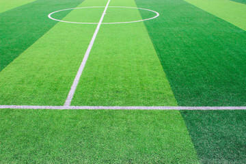 The white Line marking on the artificial green grass soccer field © Fotoglee