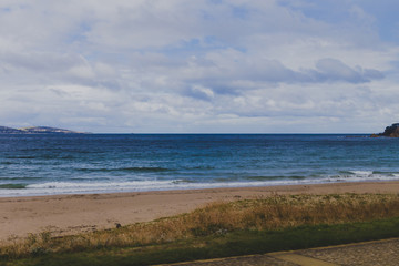 deserted beach in Hobart, Tasmania on an overcast day