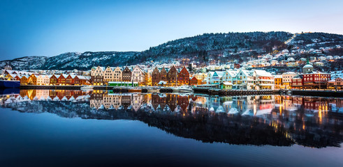 Fototapeta na wymiar Famous Bryggen street with wooden colored houses in Bergen at Christmas, Norway