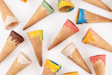 Glazed ice cream cones on a white background