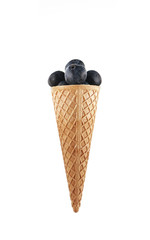 ice cream cones with blueberries isolated on a white background