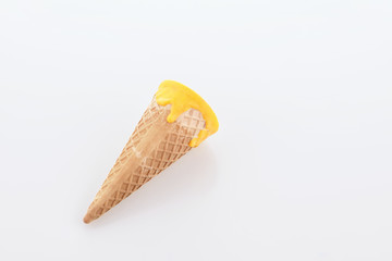 Glazed ice cream cone isolated on a white background