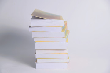 stack of books on white background