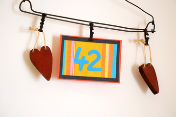 Number 42 anniversary celebration card against a bright white background