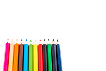 stationary colored pencil on white background