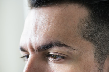 Obraz premium Side portrait of white man closeup on eyes