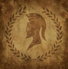 Spartan helmet an icon on old paper in style grunge, is issued in antique Greek style.