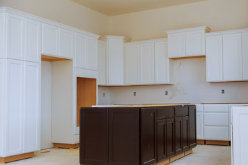 Installing new induction hob in modern kitchen installation of kitchen cabinet