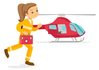 Caucasian white doctor of air ambulance running on the background of rescue helicopter. Young doctor of air ambulance carrying first aid box. Vector cartoon illustration isolated on white background.