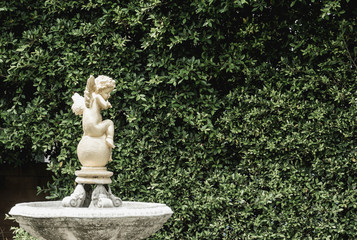 Obraz premium Statue of cupid