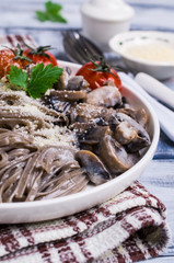 Dark pasta with vegetables