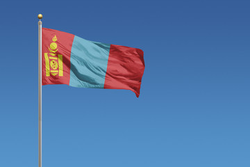 Mongolia Flag of in front of a clear blue sky