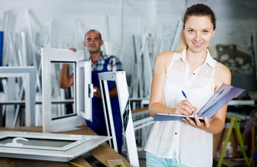 Female supervisor checking quality of work