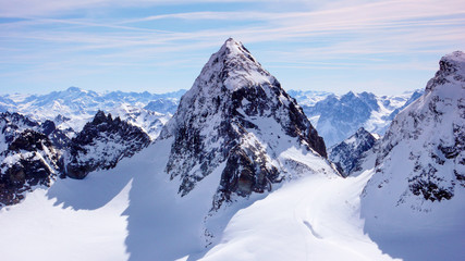 winter mountain landscape with the famous Piz Buin in the center