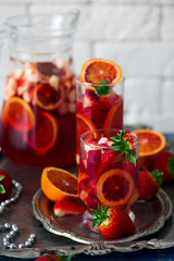 BLOOD ORANGE VANILLA BEAN ROSE SANGRIA in glasses.