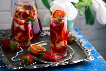 BLOOD ORANGE VANILLA BEAN ROSE SANGRIA in glasses.
