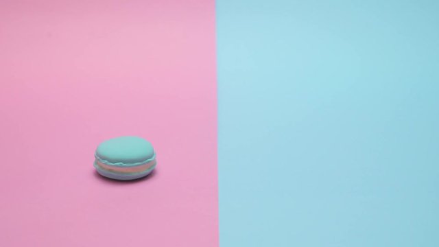 macarons on the table respectively blue and pink