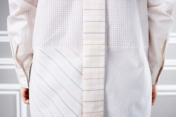 Shirt of different fabric behind