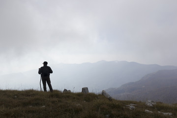 hiker on mountain peak on matese park