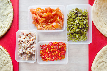 Vegetable ingredients and smoked chicken for cooking pizza top view.
