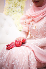 Obraz na płótnie Canvas Malay Wedding bride during the marriage ceremony. Selective Focus. Tones Image.