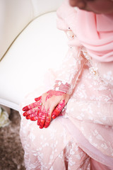 Obraz na płótnie Canvas Malay Wedding bride during the marriage ceremony. Selective Focus. Tones Image.