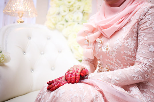 Malay Wedding bride during the marriage ceremony. Selective Focus. Tones Image.