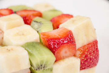 Cubes Of Fruits On A White Plate