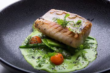 Cooked white fish fillet
