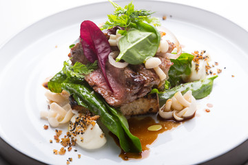 Cooked roastbeef served with herbs