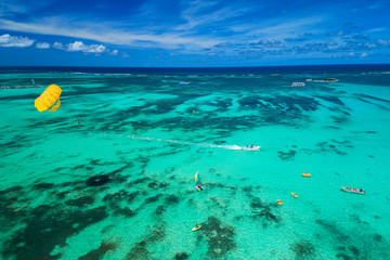 Aerial drone view of people enjoying water sports sea activities for sport, fun, leisure or...