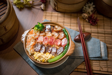 Pork meat grilled with fresh vegetable salad.