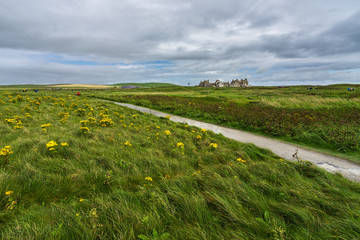 Orkney magnificent landscape near Skara Brae Neolithic settlement with Skaill House on the foreground, Scotland, Britain