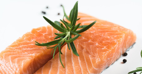 Slices of the fresh salmon on white