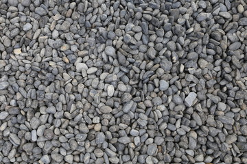 Fototapeta na wymiar grey Pebble floor texture, top view.
