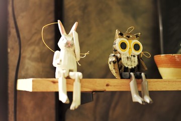 Wooden animal puppets sitting on the shelf