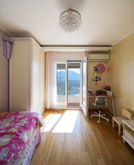 Neat and clean bedroom, nobody inside