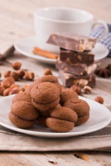 Hazelnut shortbread sandwiches filled with chocolate cream. 