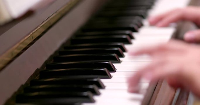 Man practicing piano