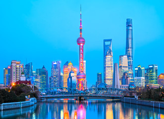 Fototapeta premium Panoramic view of Shanghai skyline at su set, China.