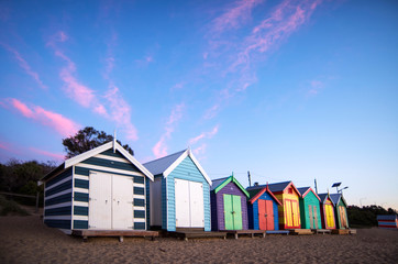 Bathing Boxes in Melbourne at dusk with coloured sky