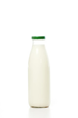 close-up view of bottle with fresh organic milk isolated on white