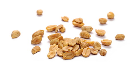 Salted and marinated peanut pile isolated on white background