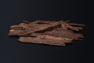 Close Up Macro Shot Of Sticks Of Agar Wood Or Agarwood Isolated On Black Background The Incense Chips Used By Burning It Or For Arabian Oud Oils Or Bakhoor