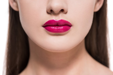 Fototapeta premium cropped shot of young woman with red lips isolated on white