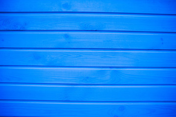 Blue wooden background. Blue painted wooden texture, background and wallpaper. Horizontal composition.