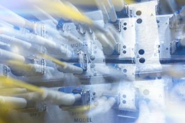 Fiber Optic SFP BNC Frame. Close up fiber optic in server room , network cables installed in the rack.  Yellow optical network cables. Audio large data center. 